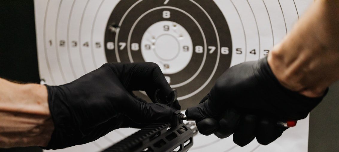 A group of young people are posing for a picture together and smiling.
