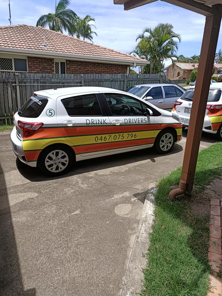 A Car is Parked in a Driveway Next to a House — Drink Drivers Hervey Bay in Urangan, QLD
