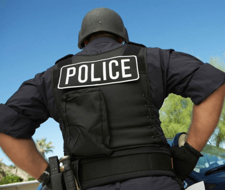 A Police Man With Black Uniform— Houston, TX — Dixie Safe & Lock Service Inc.