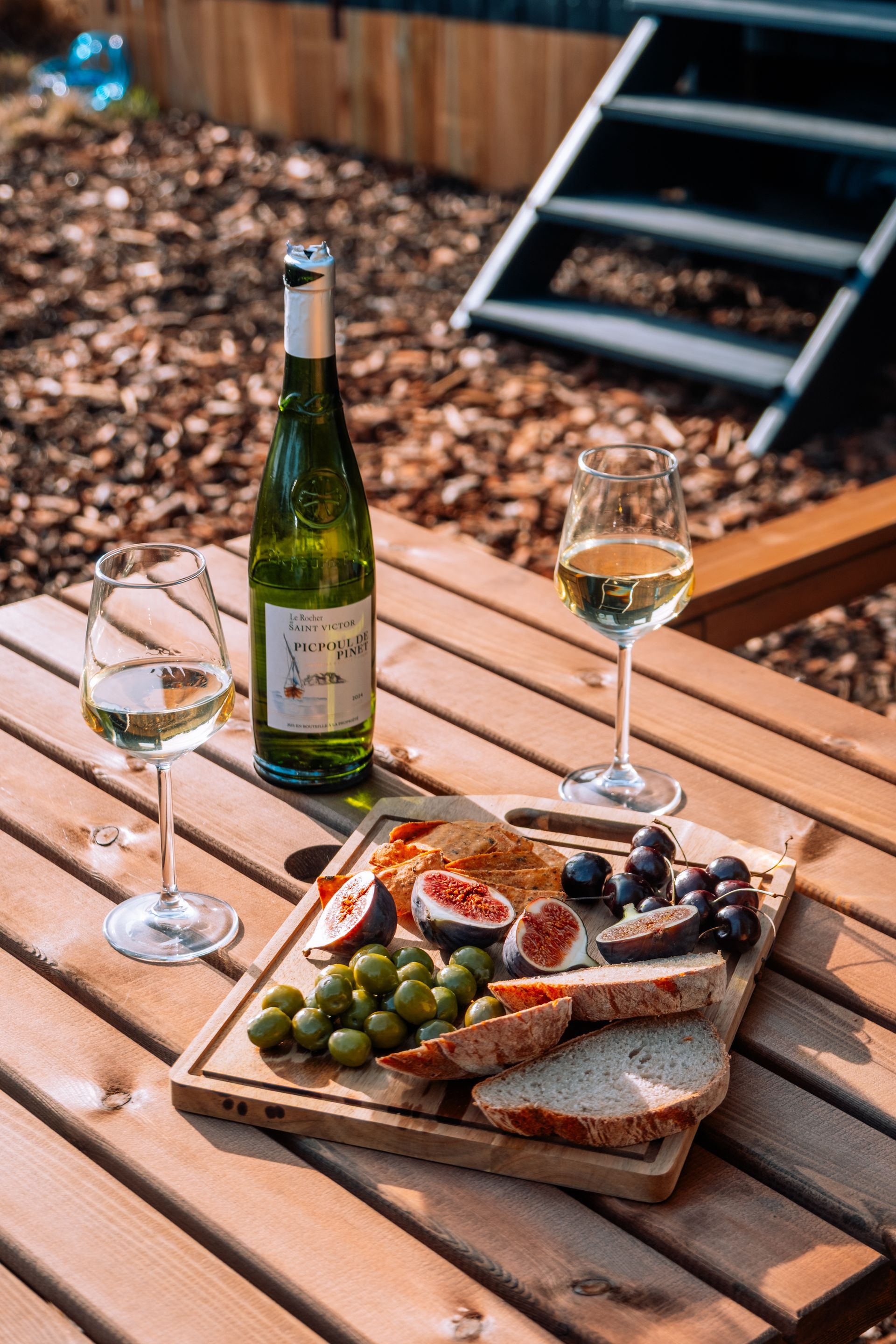 Wine and snacks next to the cabin on a summers evening