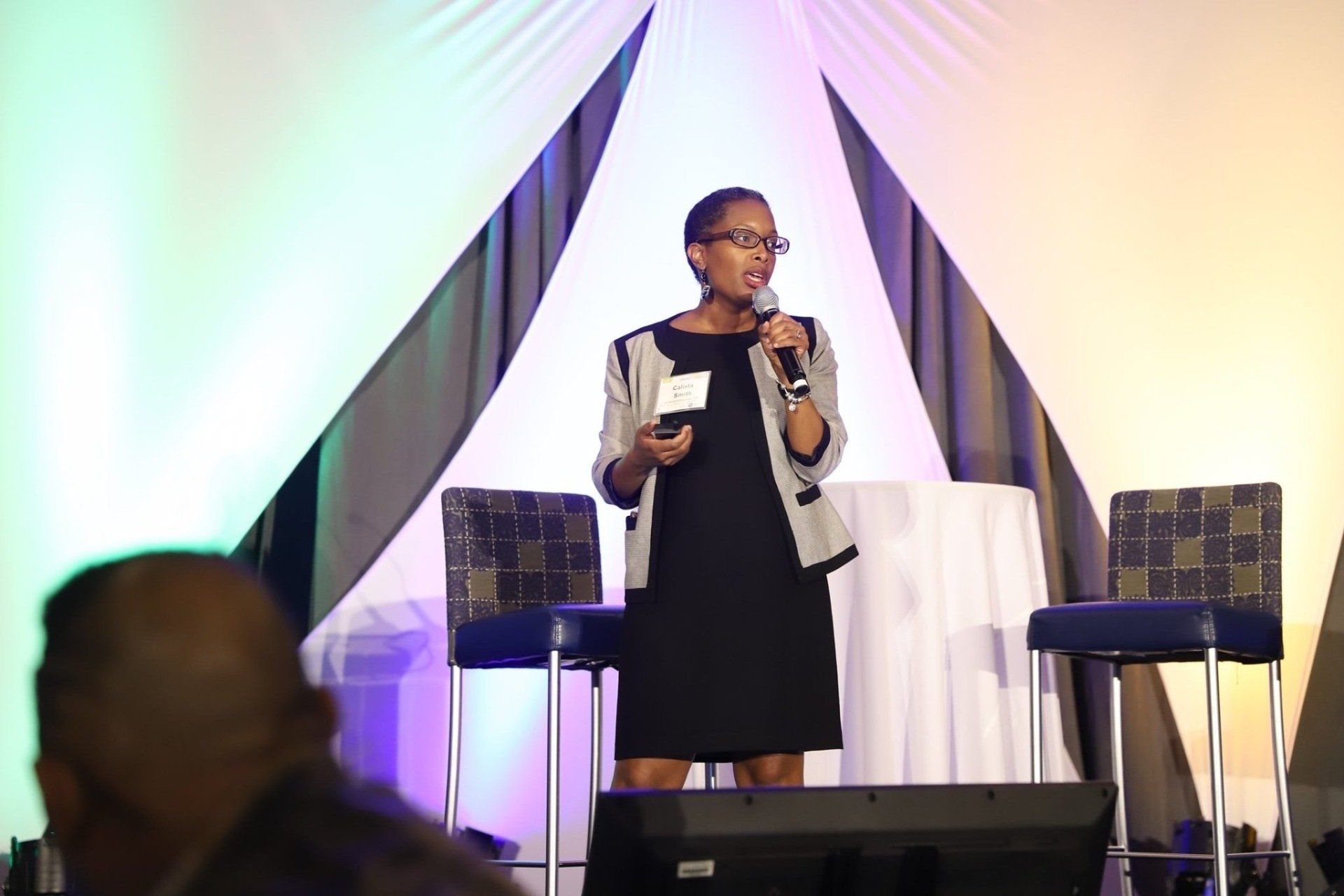 Calista Smith talking on a stage