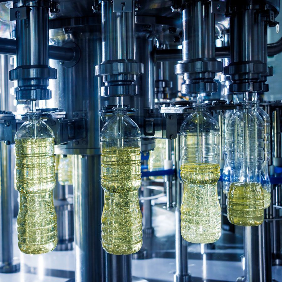 A photo of a bottling line at a sunflower oil production facility
