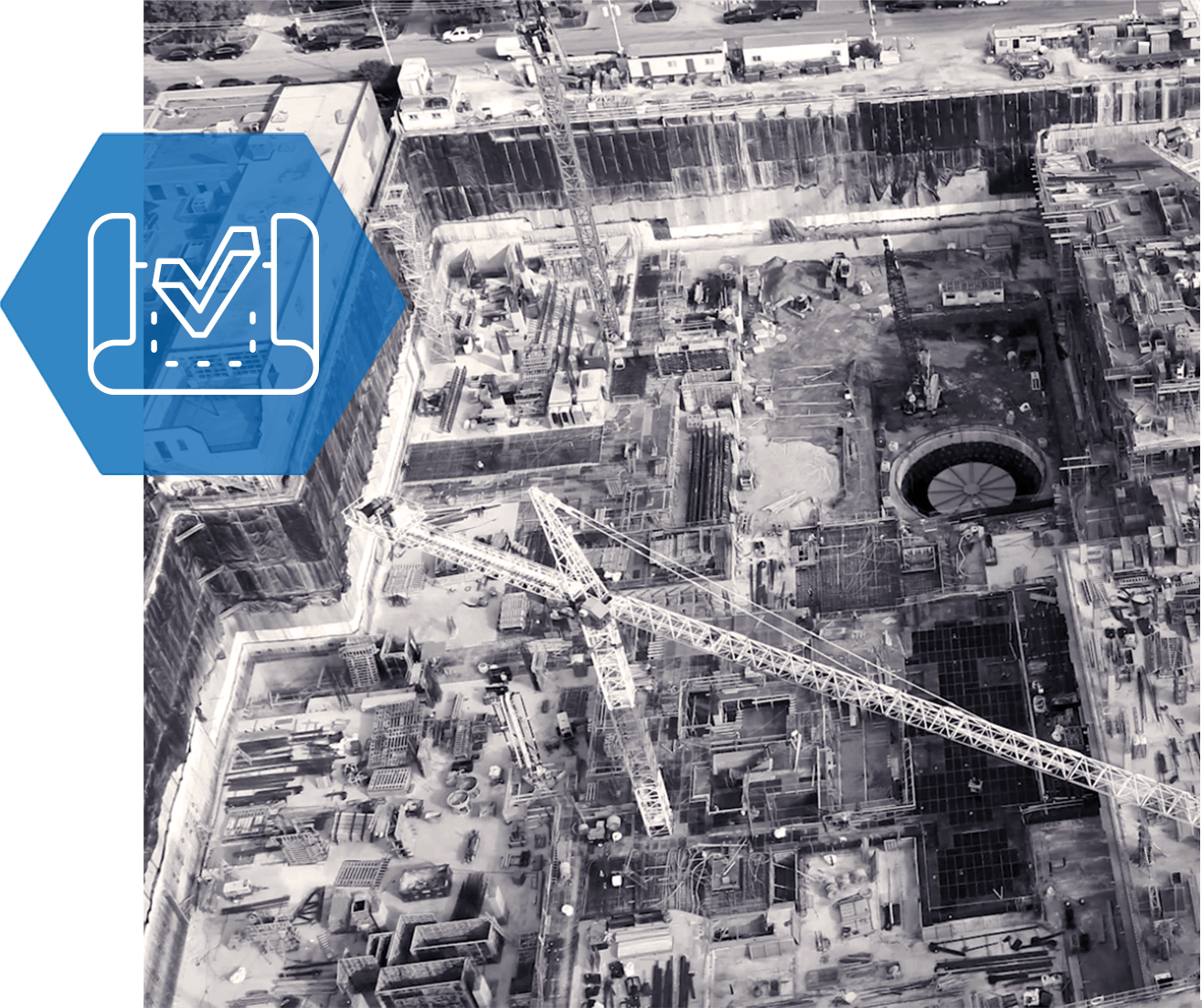 An aerial view of a construction site with a check mark.