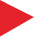 A close up of a red triangle on a white background.