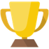 A yellow trophy on a wooden base on a white background.