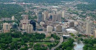An aerial view of a city with a river running through it.