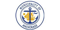 The logo for the municipality of anchorage has an anchor and a boat in it.