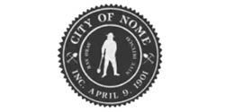 A black and white logo for the city of nome