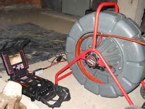 Tools in use for residential drain cleaning in Davenport, IA