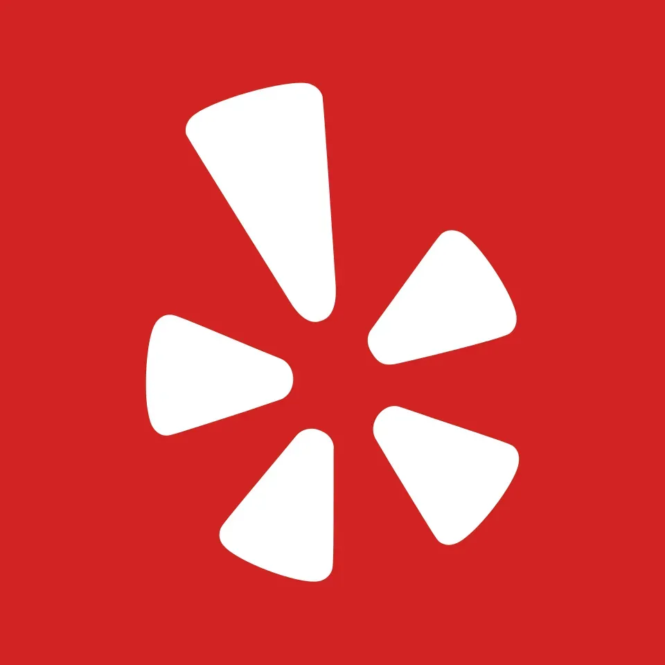 White Yelp logo on a red background