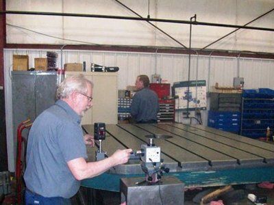 Surface Grinding — Worker Doing Some Calibration In Kaukauna, WI