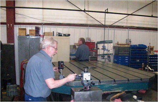 Alignment — Worker Doing Some Alignment Calibration In Kaukauna, WI