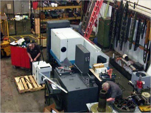 Machine Retrofit And Upgrades — Production Area Of Precision Scraping INC In Kaukauna, WI