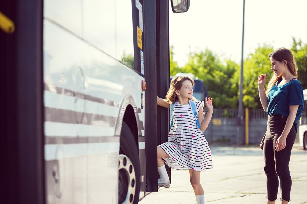 Mother Looking at Daughter Entering Bus — Cotswold Hills, QLD — Robertson's Bus & Coaches