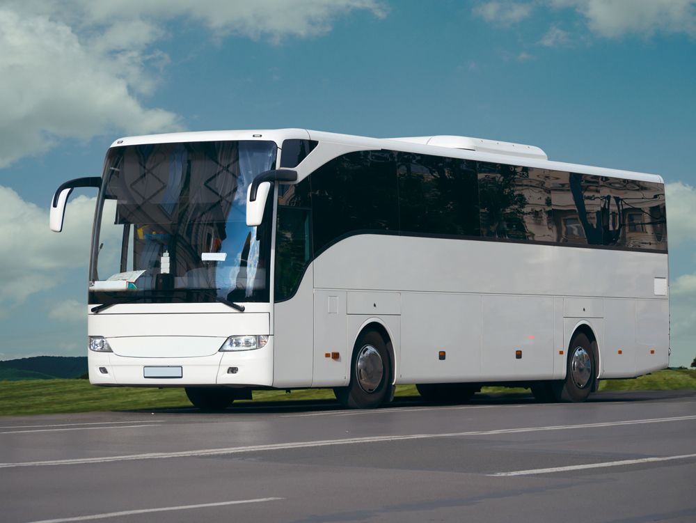 Bus on the Road — Cotswold Hills, QLD — Robertson's Bus & Coaches