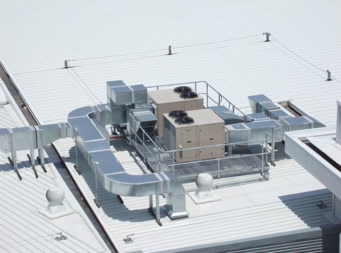 an aerial view of an air conditioning system on the roof of a building