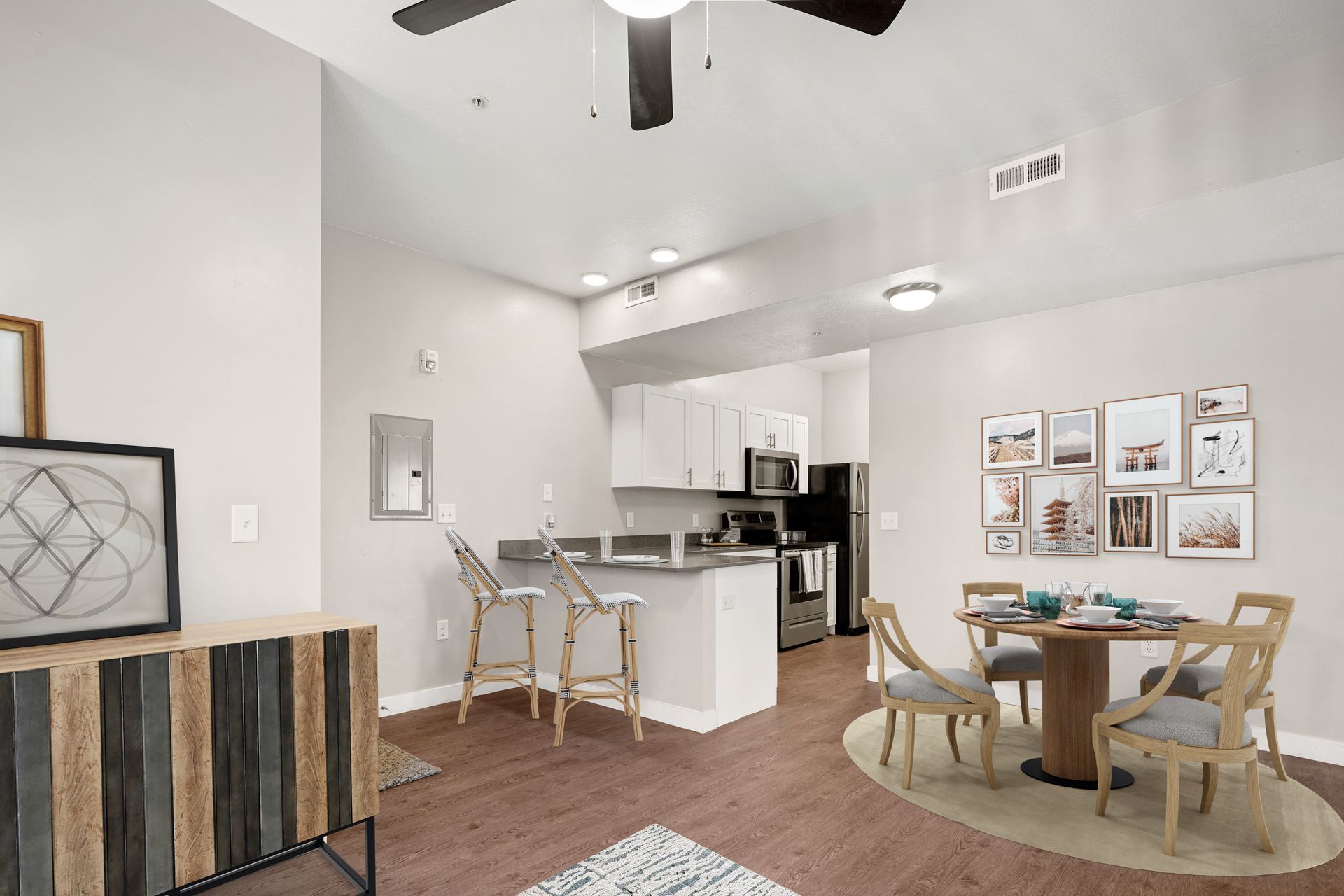 a kitchen with a stove , sink , and counter top .
