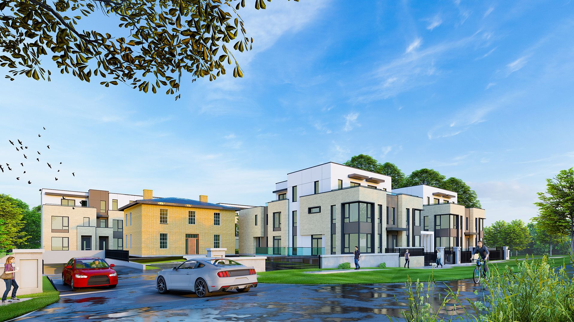 Residential complex with cars parked, a blue sky, and greenery.