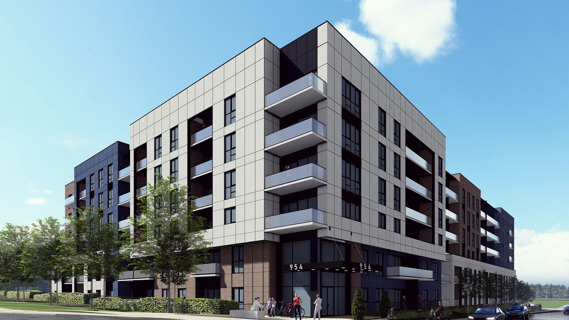 Modern multi-story apartment building with balconies, brick and gray facade under a blue sky.