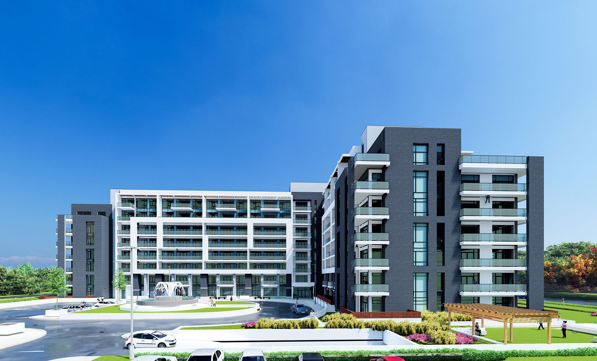 Modern multi-story apartment building with gray and white facades under a blue sky.