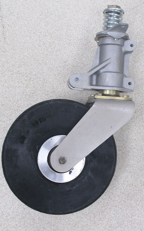 A rubber wheel with a metal bracket attached to it