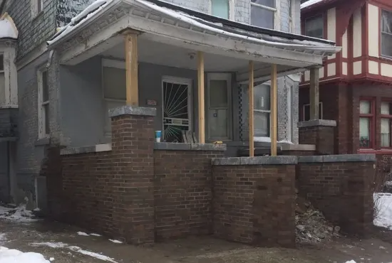 Brick porch before repair