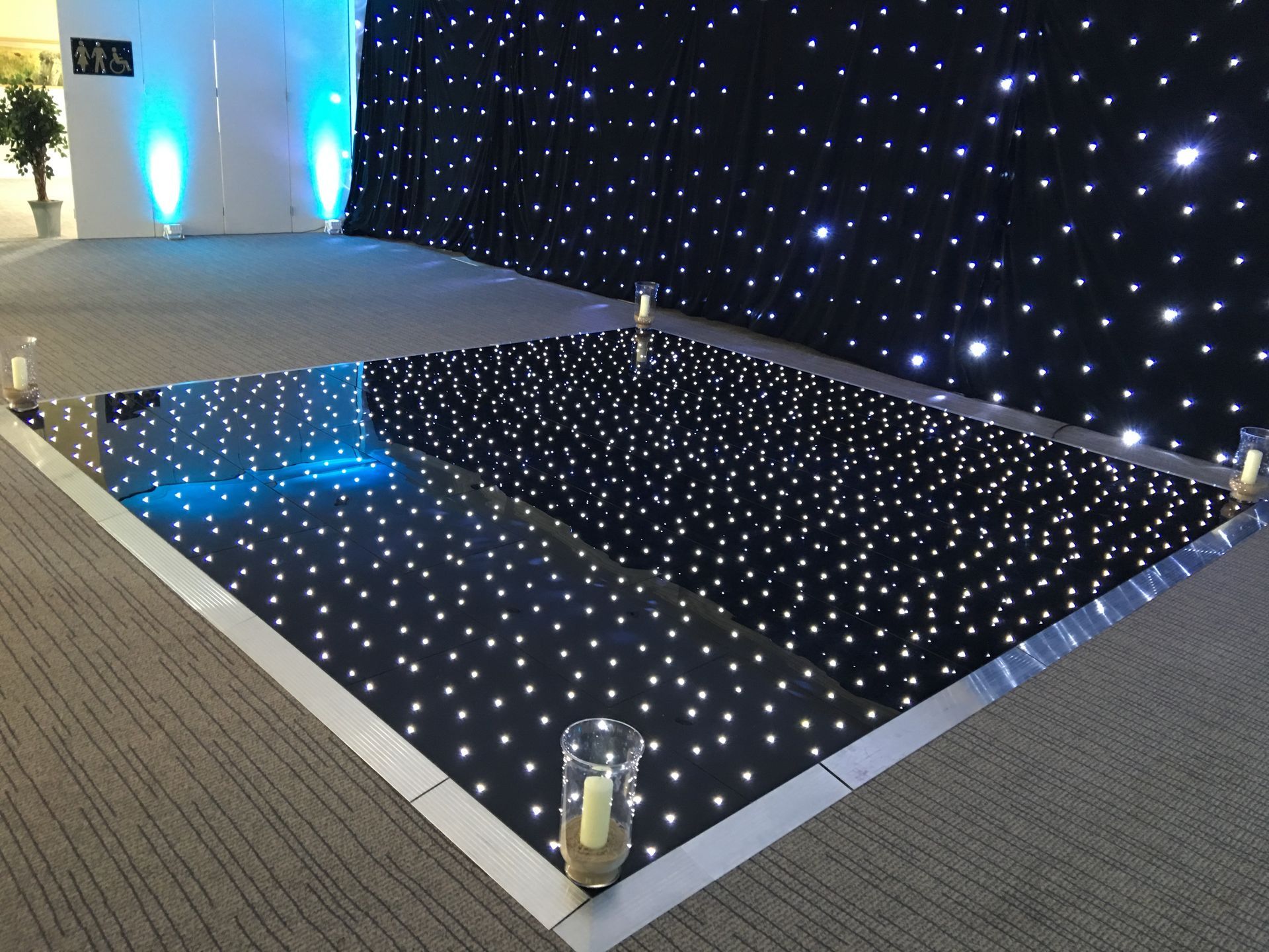 Black base with white lights for this light up dance floor. Production services and equipment  hire for this event was supplied by Exclusive Entertainments Harrogate,Yorkshire