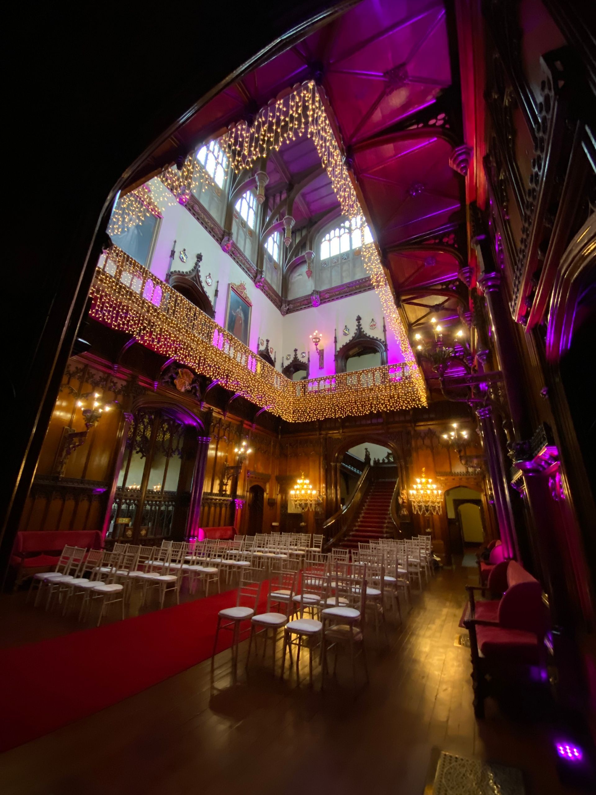 Custom made fairy lights and pink up lights create a beautiful scene at Allerton Castle. Decor and Lights from Exclusive Entertainments, Harrogate, Yorkshire