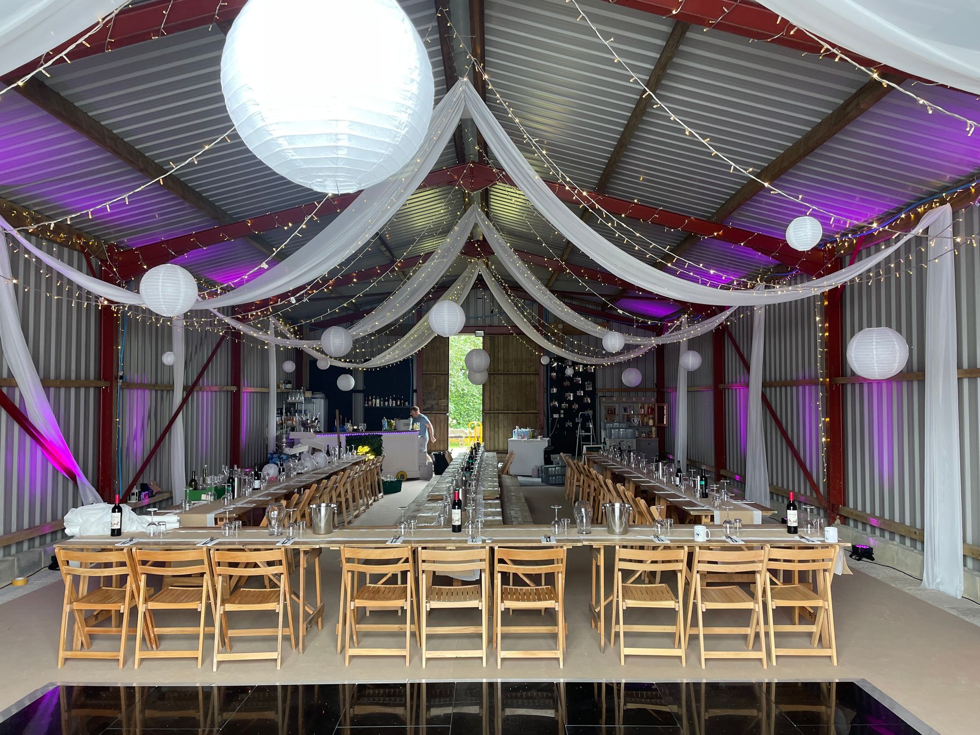 Decor and Lighting in purple and white for this event.Projection screens and  live cameras. Production services and equipment  hire for this event was supplied by Exclusive Entertainments Harrogate,Yorkshire