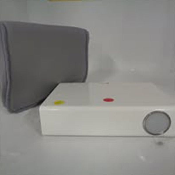 A white box with a red and yellow button on it