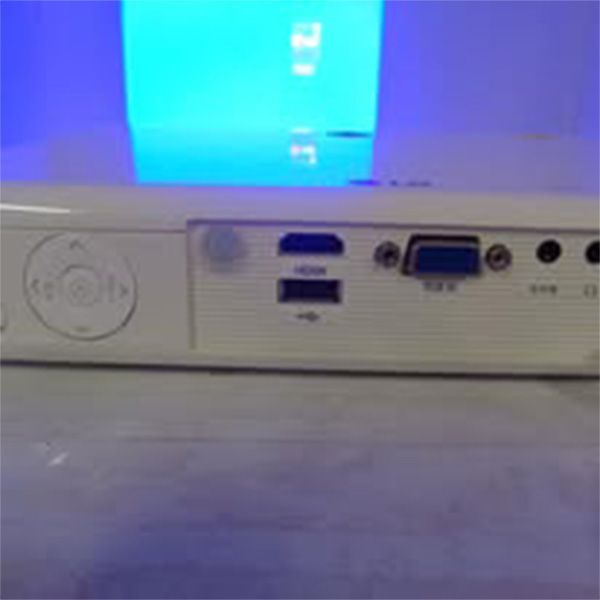 The back of a white box with a blue light behind it
