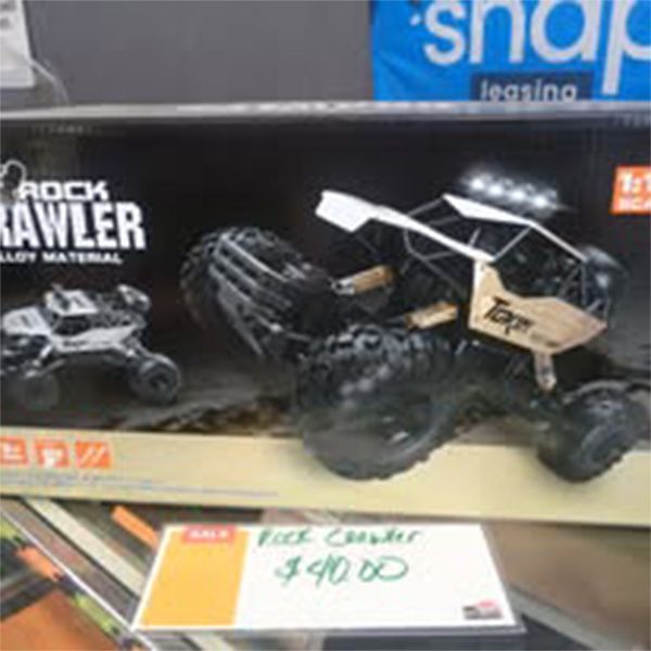 A toy rock crawler is for sale for $ 90.00