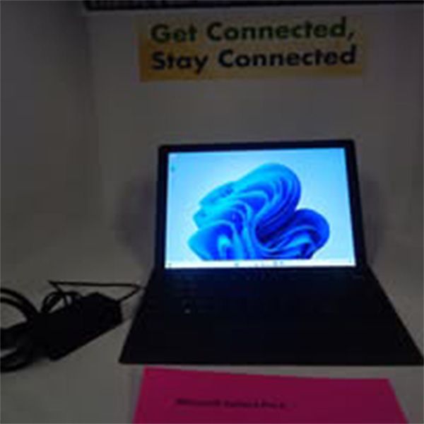 A laptop with a sign that says get connected stay connected