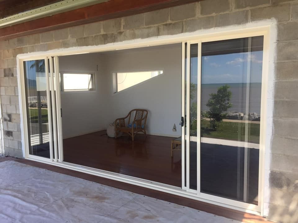 Spacious and smooth sliding glass door offering easy access and ample natural light — Cairns All Star Glass 'n' Aluminium in Tablelands, QLD