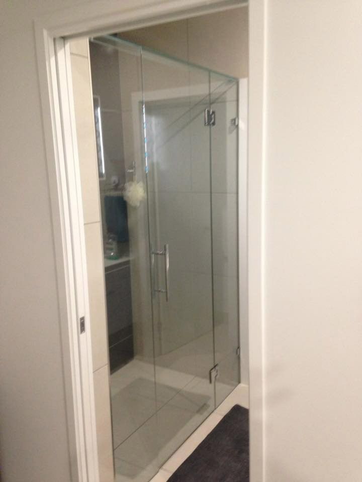 Sleek and functional glass door for the shower, offering easy access — Cairns All Star Glass 'n' Aluminium in Bentley Park, QLD