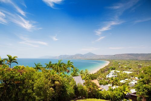 Captivating view from the beach's summit, overlooking the nearby town — Cairns All Star Glass 'n' Aluminium in Port Douglas, QLD