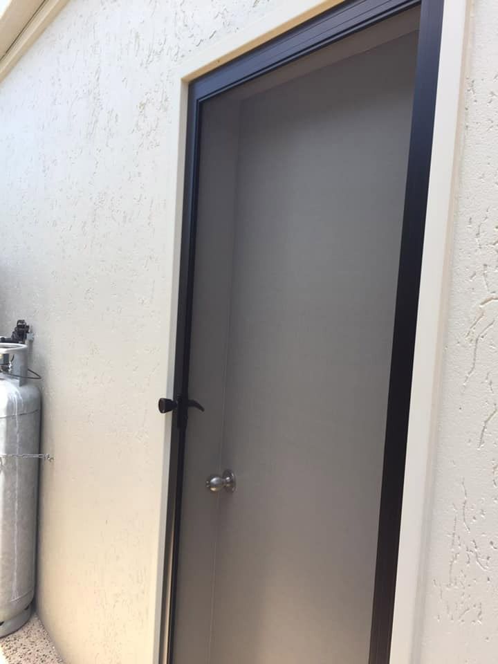 Security screen door installed to enhance safety and protection — Cairns All Star Glass 'n' Aluminium in Cassowary Coast, QLD