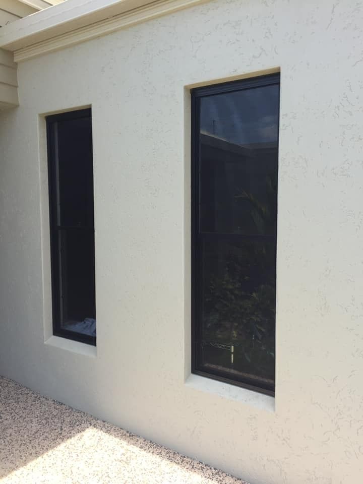 Two narrow glass windows elegantly installed on the wall — Cairns All Star Glass 'n' Aluminium in Cairns, QLD