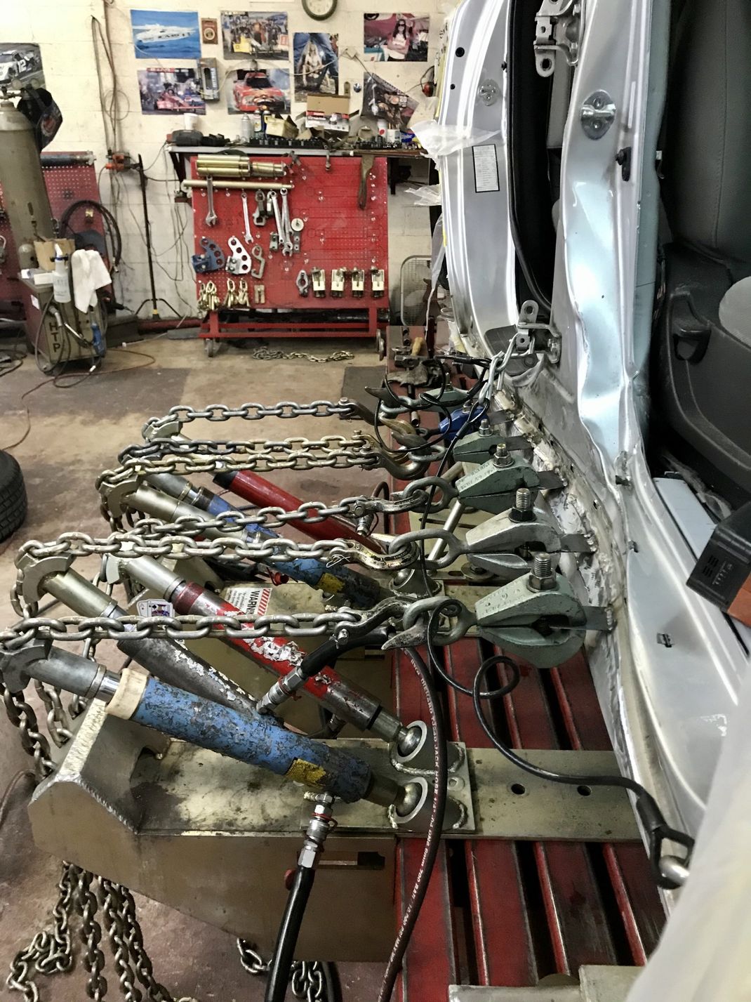 Three Pulls Out to the Side for a Auto Body Collision Shop Machine