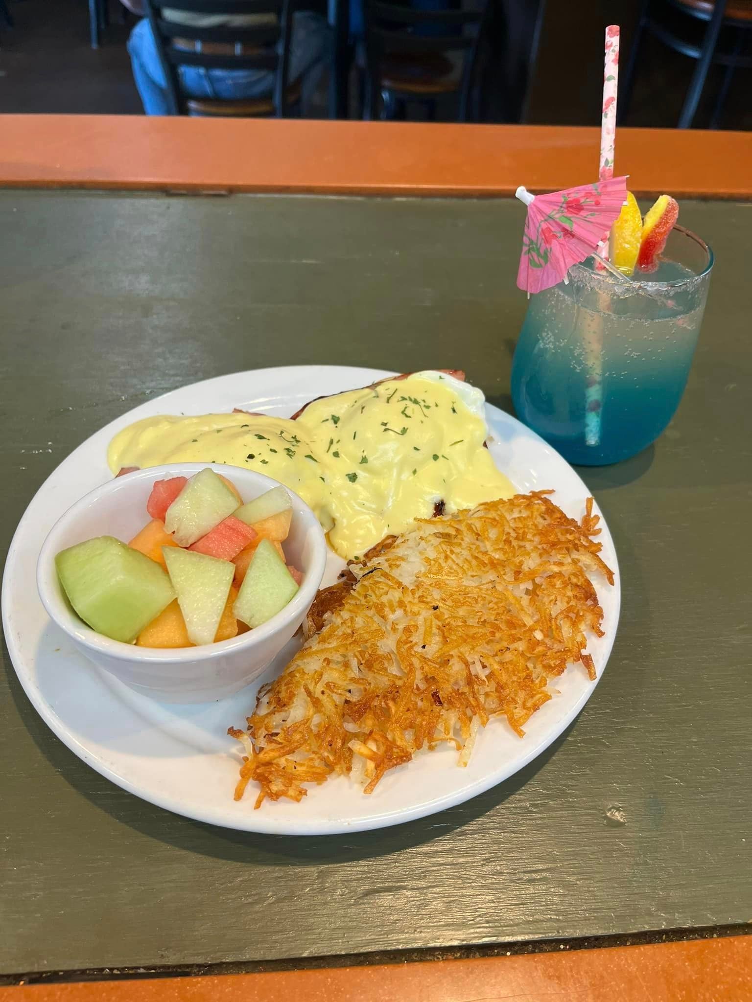 Egg Benedict and Hash Brown with Drinks and Fruits — Yuba City, CA — Midtown Grill