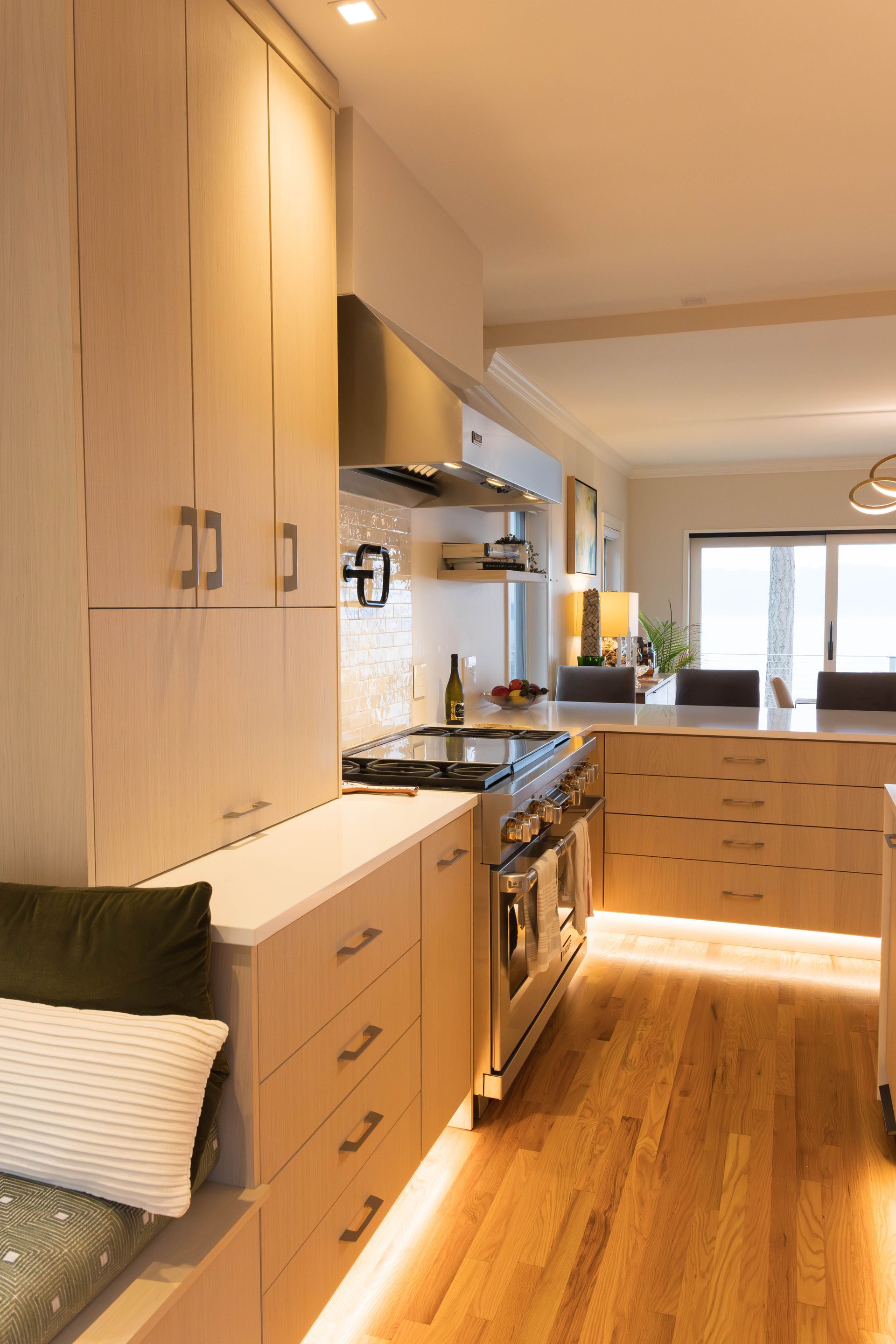 Custom kitchen cabinets and premium appliances in a Bellingham, WA kitchen remodel by Alderwood Builders.