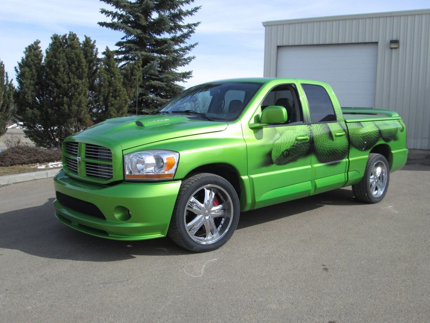 large lime green ram truck with body work and custom paint job