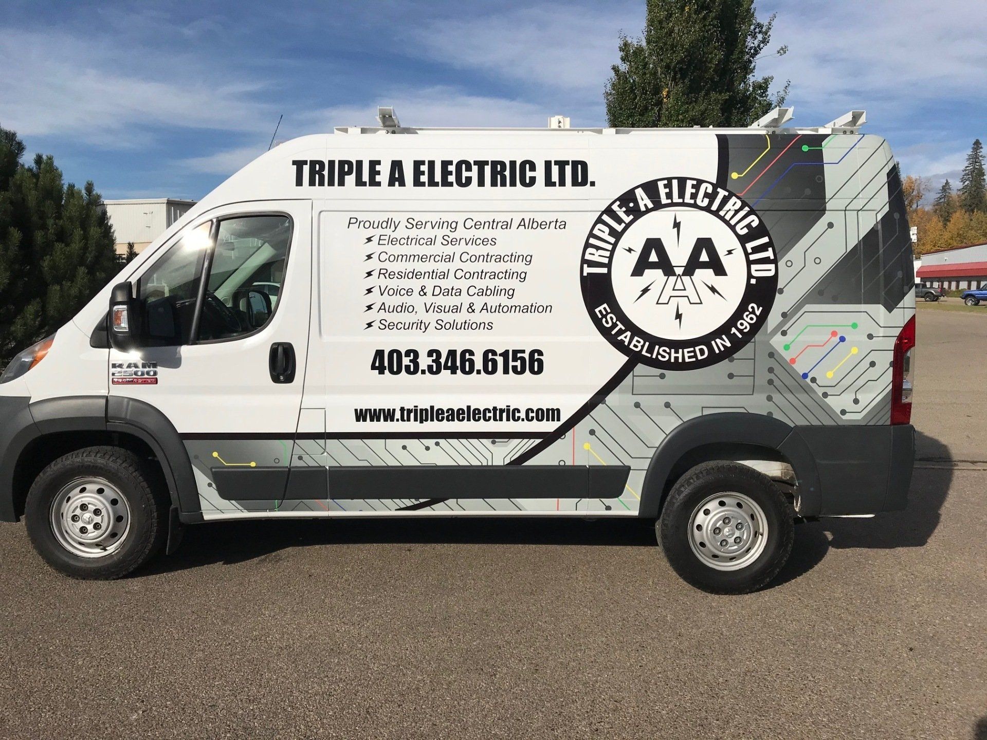 a white van with triple a electric ltd. written on the side
