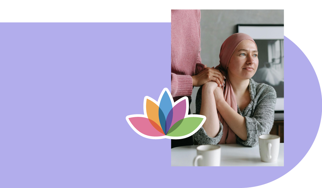 A woman with cancer is sitting at a table with two cups of coffee.