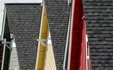 Colorful House with brick roofs - Roofing services in Flemington, NJ