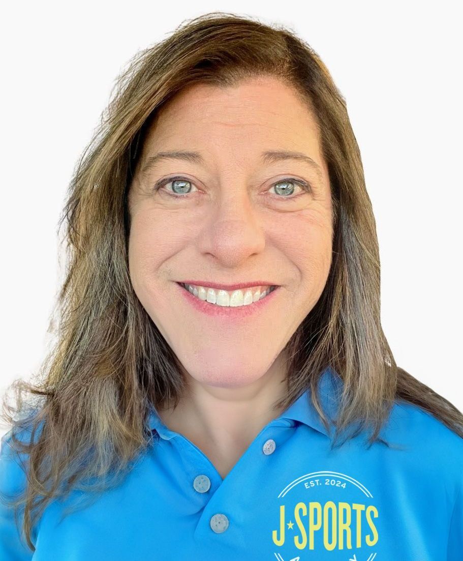 A woman wearing a blue shirt that says j sports