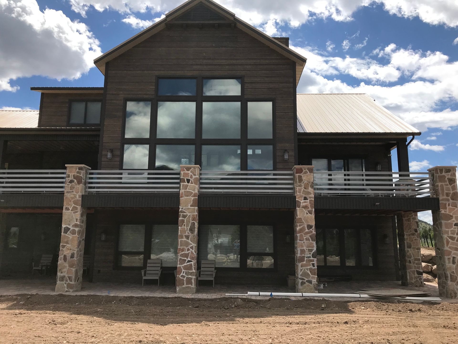 A large house with a lot of windows and balconies