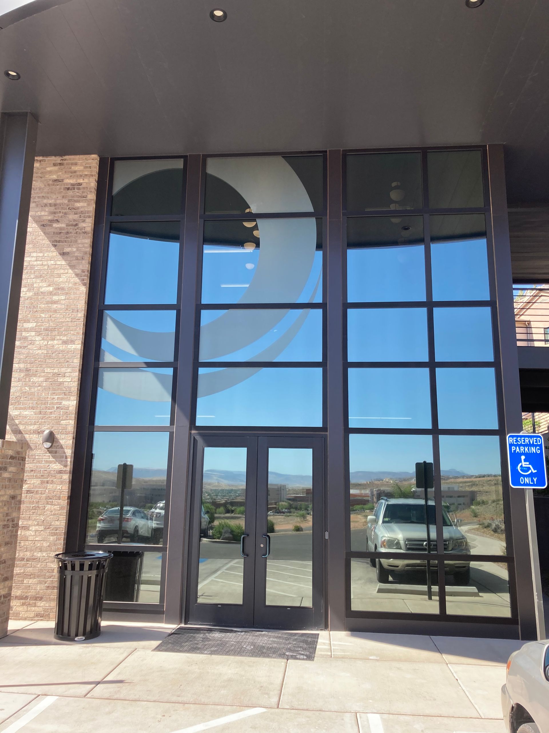 A building with a handicapped parking sign in front of it