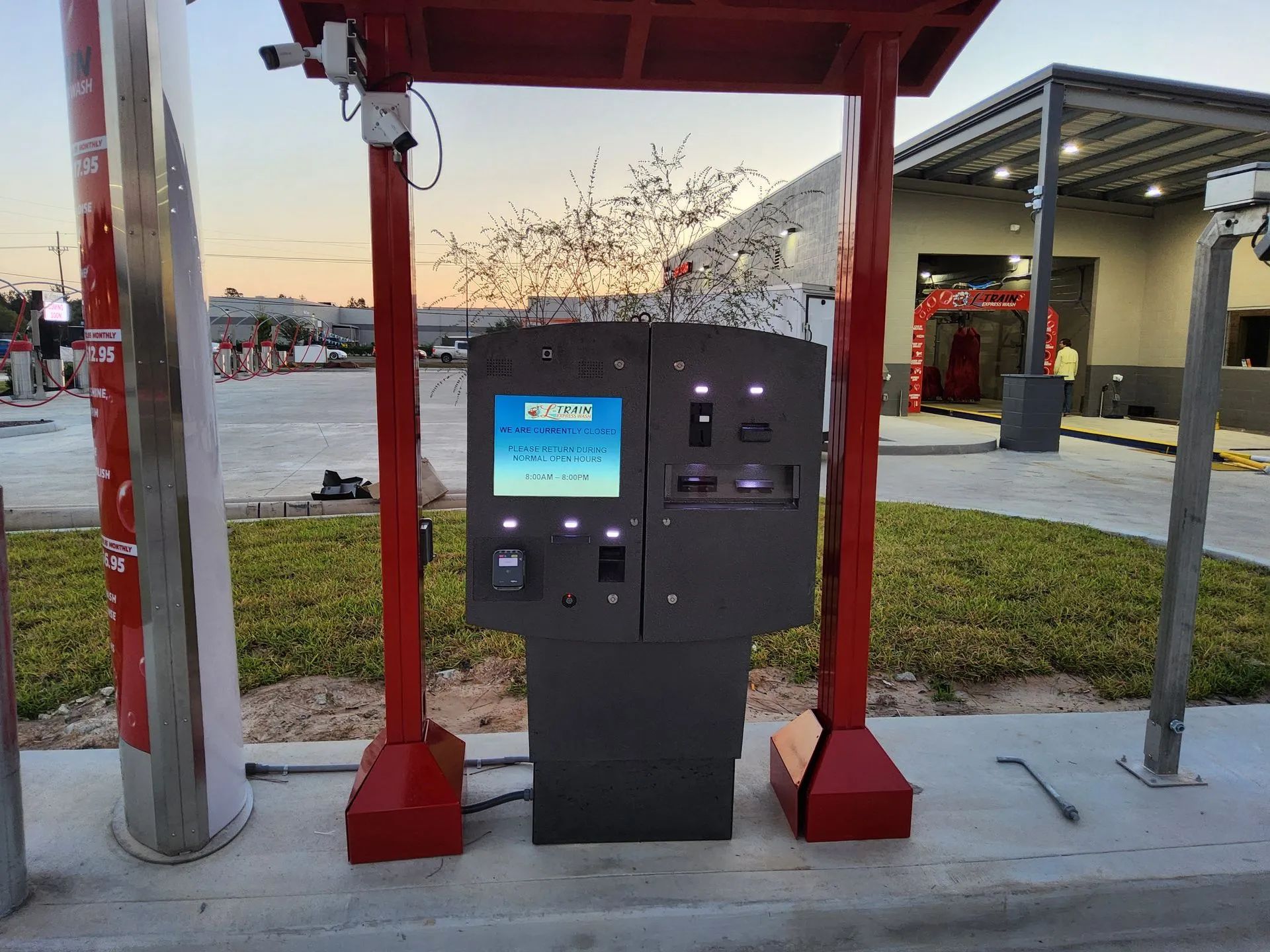 A machine with a screen that says ' checkout ' on it