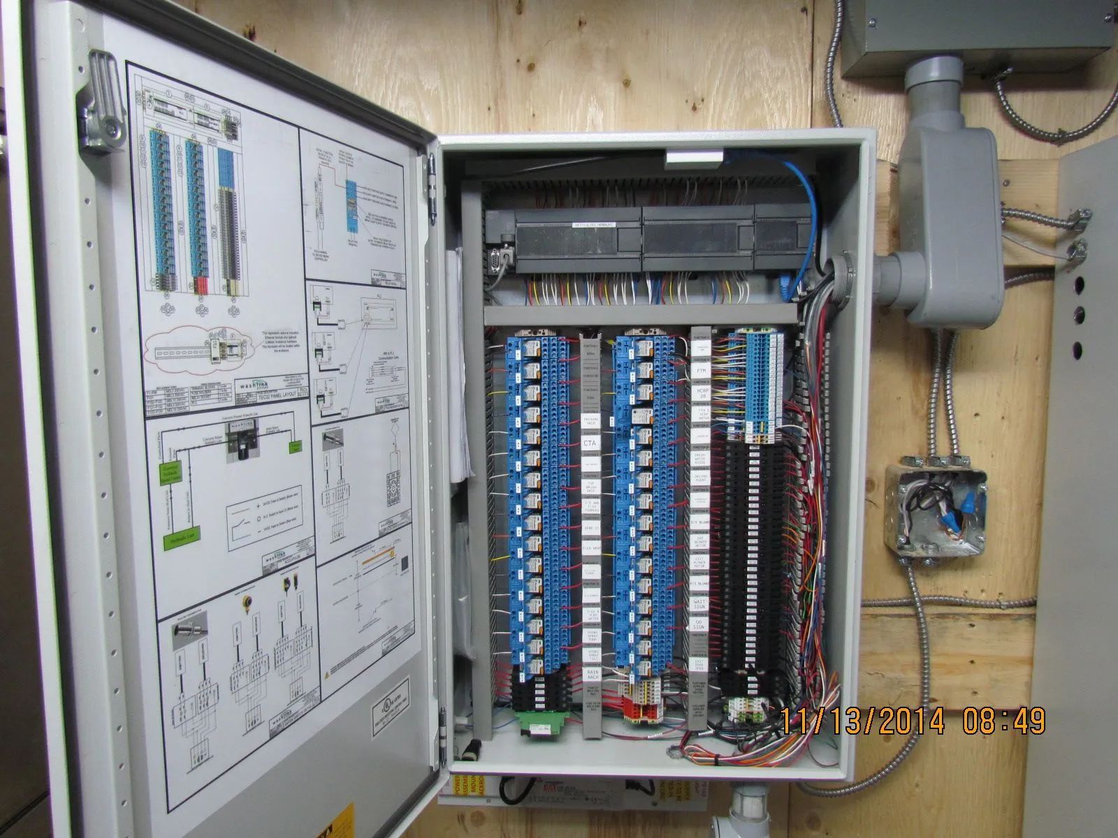 A box with a lot of wires inside of it